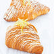 Dipped pastries with lemon coating